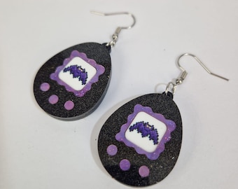 Kolczyki z akrylu inspirowane Tamagotchi w kształcie nietoperza, z przekłuciem i klipsem