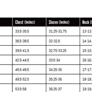 May include: A size chart for men's tees, with measurements in inches. The chart includes sizes XS to XXXL, detailing chest, sleeve, and neck measurements for each size. The text is in a clear, easy-to-read format.