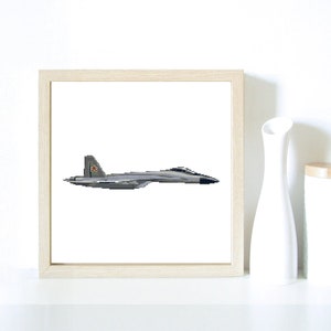 May include: A framed print of a grey fighter jet with a red star on the tail, against a white background.