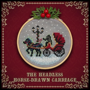 May include: A cross-stitch embroidery design of a horse-drawn carriage with a headless driver, set against a snowy background. The carriage is red, the horse is black, and the scene is framed by a wooden hoop.