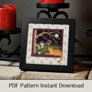 May include: A cross-stitch pattern featuring a cat looking out a window at a spooky night scene. The window is framed in purple and the scene includes a tree, a moon, and a hand reaching out from behind the tree. The pattern is framed in black and is ready for instant download.