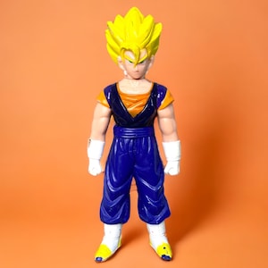 Vintage Dragon Ball Z Gohan Super Saiyan action figure from 1989, detailed collectible for anime fans.