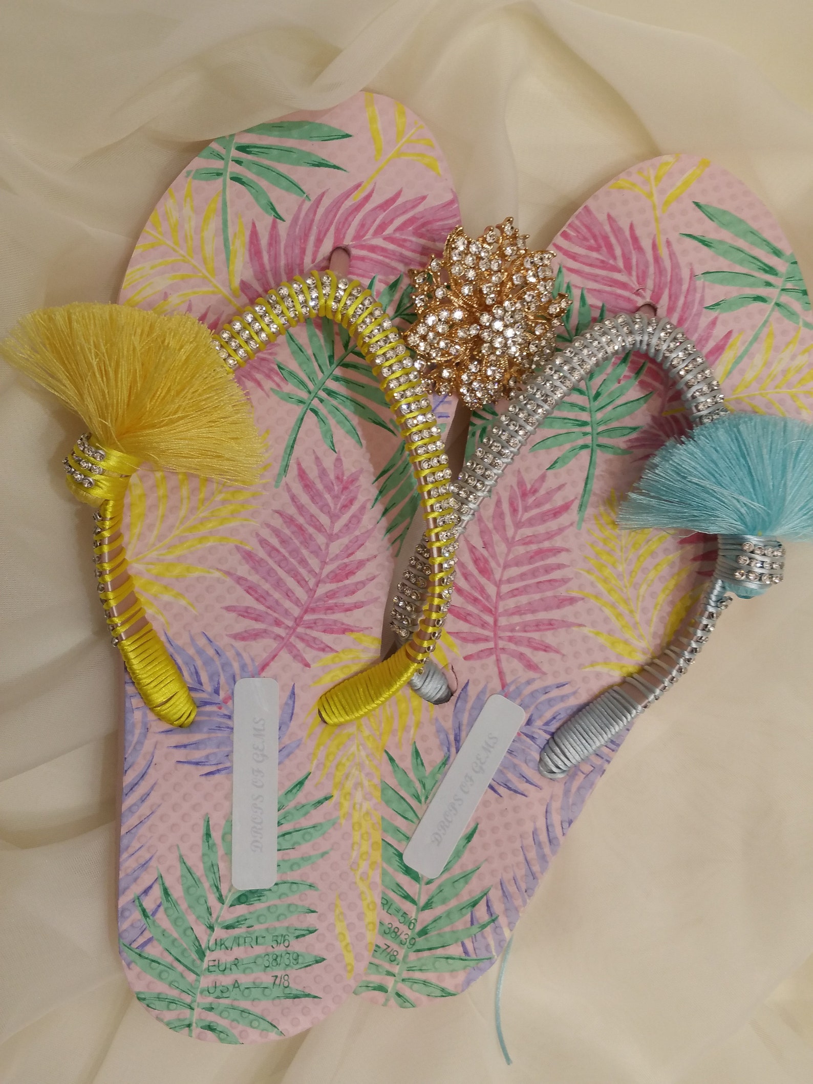 Embellished Flip Flops with Mismatched Baby Blue and Light-Yellow Coloured Pompoms