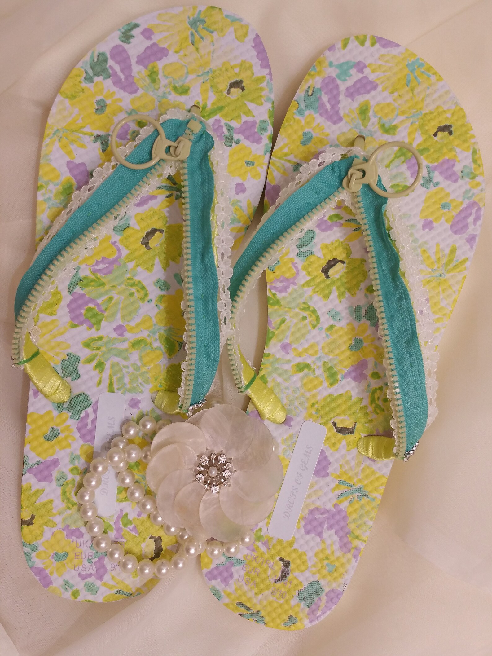 Decorated Flip Flops with Light Green Coloured Zipper