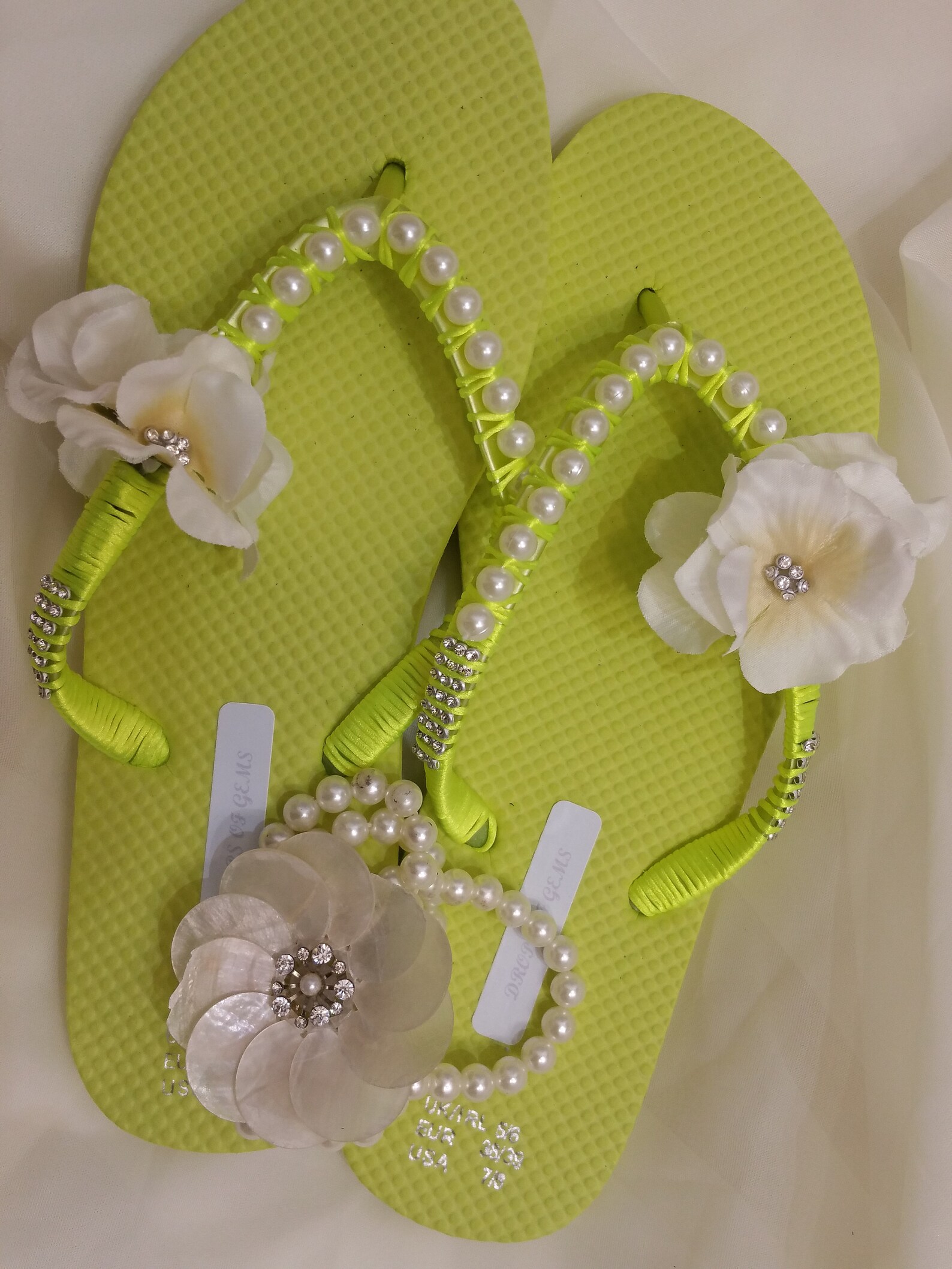 Decorated Flip Flops with Pearls and White Silk Flowers Enriched with Rhinestones