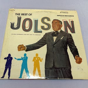 May include: Vintage vinyl record album cover titled "The Best of Jolson." The cover features a painted illustration of a man in a suit, with the name "JOLSON" in large letters. The album is a Decca Records release.