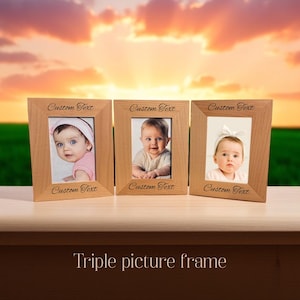 May include: Triple picture frame made of natural wood with a light brown finish. Each frame has a rectangular opening for a 4x6 inch photo. The frames are arranged side-by-side and have the text "Custom Text" engraved on the top and bottom of each frame.