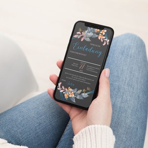 May include: A smartphone displaying a digital invitation with a floral design. The invitation reads "Herzliche Einladung zum Geburtstag!" with a date of August 27, 2022.