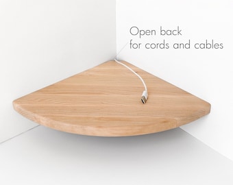 Corner shelf with hole in back for cords for speakers, router, camera, baby monitor, humidifier, monitor