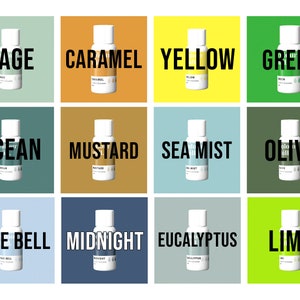May include: Twelve small bottles of essential oil with labels in various colors, including sage, caramel, yellow, green, ocean, mustard, sea mist, olive, blue bell, midnight, eucalyptus, and lime.