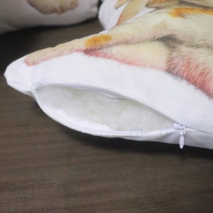May include: White pillow with a zipper closure. The pillow has a printed image of a dog on the front.