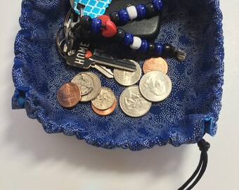 Regulowana, składana miseczka materiałowa na monety, klucze, drobne przedmioty itp. Podróżuje z Tobą!