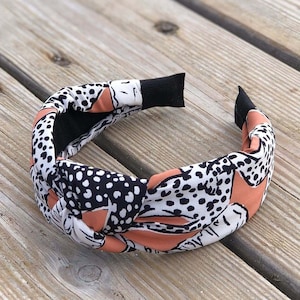 Pastel Pink Animal Print Headband-Chic Turban Style with Black & White Accents