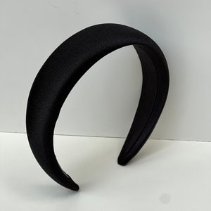 Stay comfortable and stylish with these black satin headbands, featuring a padded design for all-day wear.