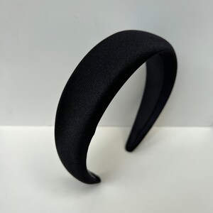 Add some sophistication to your hair with these black satin headbands, perfect for everyday elegance or special occasions.