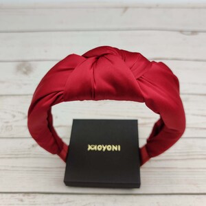 Show her how much you care with this beautifully crafted red satin wide headband.