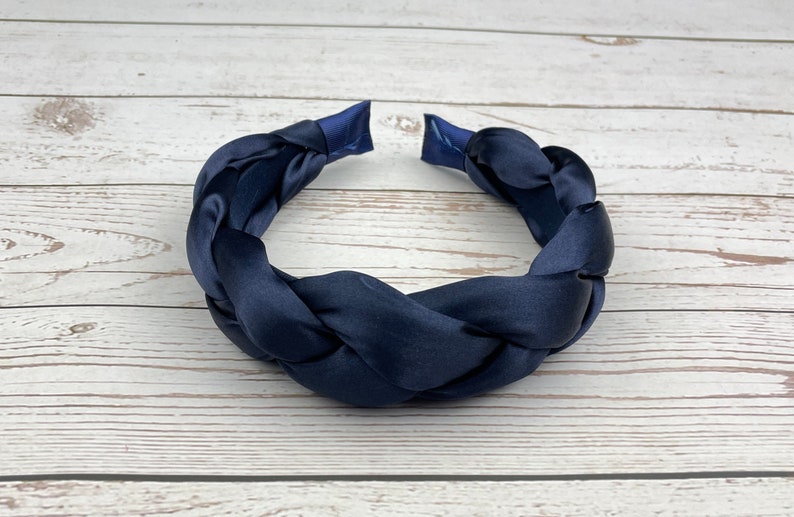 Add some style to your look with this navy blue satin headband