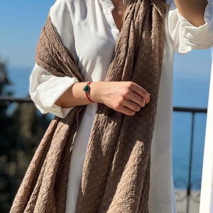 Choosing a scarf as an accessory in your outfit can be a good idea; it adds beauty and elegance to your fashion game, be it for religious purposes, fashion purposes, or sun protection, a scarf always serves its purpose.