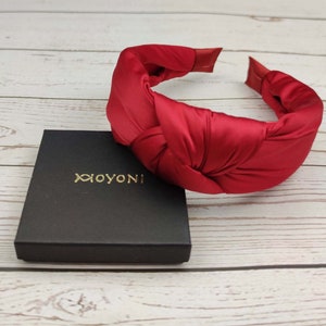 Celebrate a special Day with love and style - a red satin headband for the special woman in your life.