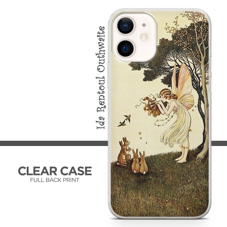 May include: A clear phone case with a full back print of a vintage illustration of a fairy with wings, holding a flower, and surrounded by rabbits. The text "Ida Rentoul Outhwaite" is printed on the side of the case.