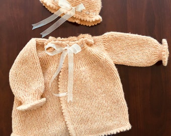 Girl, toddler, woollen, beige, walnut, caramel, neutral colour, jacket (wrap cardigan) and bonnet set, handknitted, soft wool.