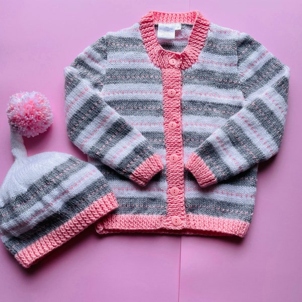 Girl’s size 2, handknitted, woollen, cardigan and hat; striped, pink, grey, white, merino wool and acrylic mix.