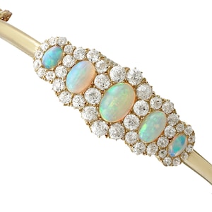 Victorian 3.92ct Opal and 3.25ct Diamond, 18ct Yellow Gold Bangle