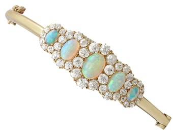 Victorian 3.92ct Opal and 3.25ct Diamond, 18ct Yellow Gold Bangle