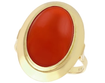 May include: A gold ring with a large oval-shaped red gemstone. The ring is marked "585" on the band.