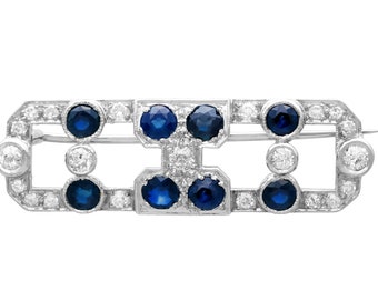 Art Deco 3.20 carat Sapphire and Diamond Brooch in White Gold