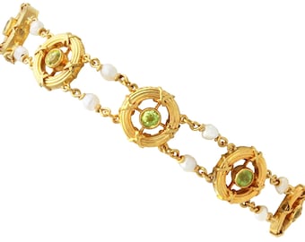 Pulsera antigua de peridoto de 1,35 ct con perla natural en oro amarillo de 15 ct, circa 1900.