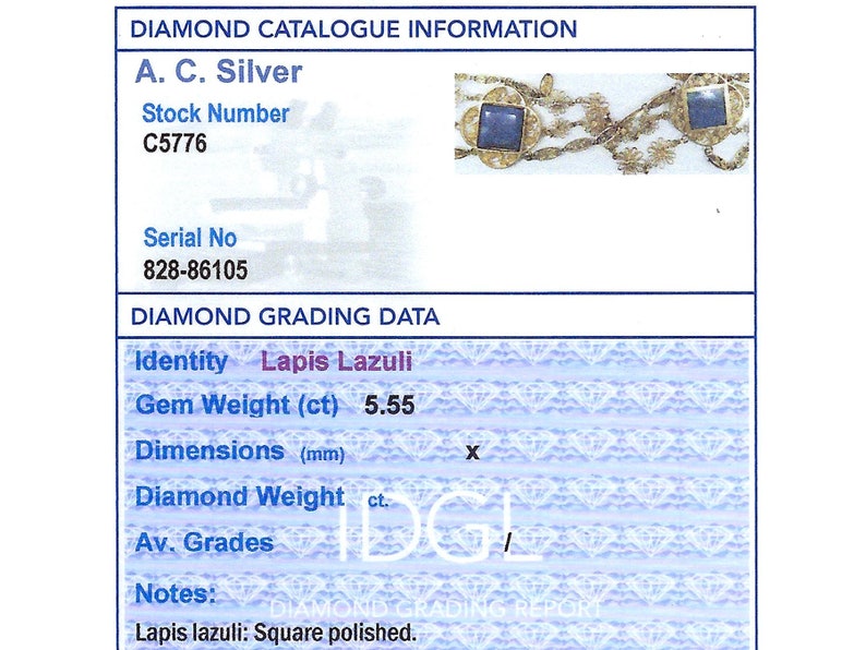 May include: A close-up of a jewelry piece featuring two square lapis lazuli stones set in gold. The stones are surrounded by a delicate gold chain. The image includes the text "Diamond Catalogue Information", "A. C. Silver", "Stock Number C5776", "Serial No 828-86105", "Diamond Grading Data", "Identity Lapis Lazuli", "Gem Weight (ct) 5.55", "Dimensions (mm)", "Diamond Weight ct.", "Av. Grades", "Notes:", "Lapis lazuli: Square polished."