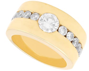 Anel vintage com diamante de 1,65 ct em ouro amarelo 18k, datado de aproximadamente 1990.