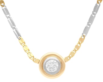 Zabytkowy wisiorek z diamentem o masie 0,72 ct w 18-karatowym złocie, około 1990 r.