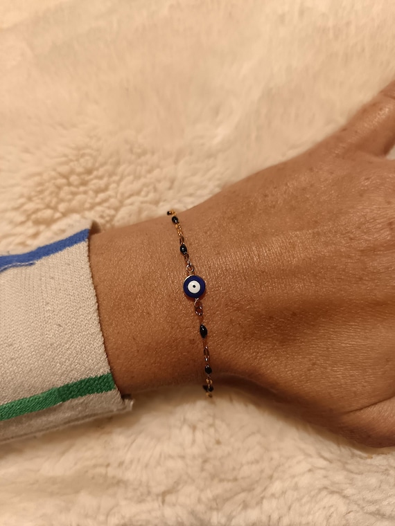 Women's bracelet with gold chain, stainless steel in gold color, black or white beads, Turkish blue eye protection against the evil eye (matiasma)