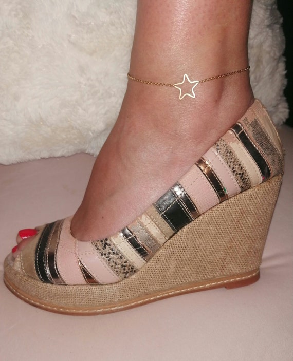 Gold-tone stainless steel anklet with star connector, handcrafted.