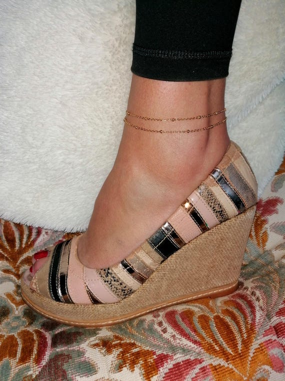 Double-strand gold-tone stainless steel anklet bracelet with gold-tone beads, available in various sizes, handcrafted.