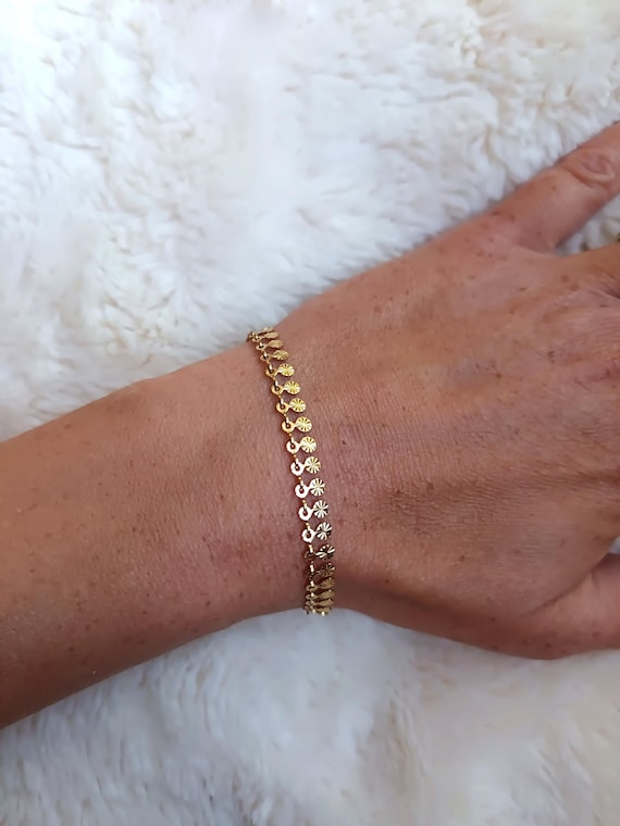 Women's bracelet with a gold chain, stainless steel in a gold color, boho style, small mandala pendant medallions, handcrafted.