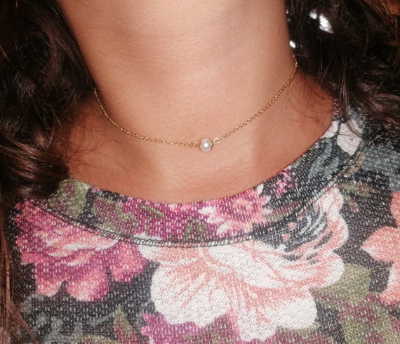 Women's choker necklace, gold-tone stainless steel chain, mother-of-pearl bead, gold spacers, handcrafted.