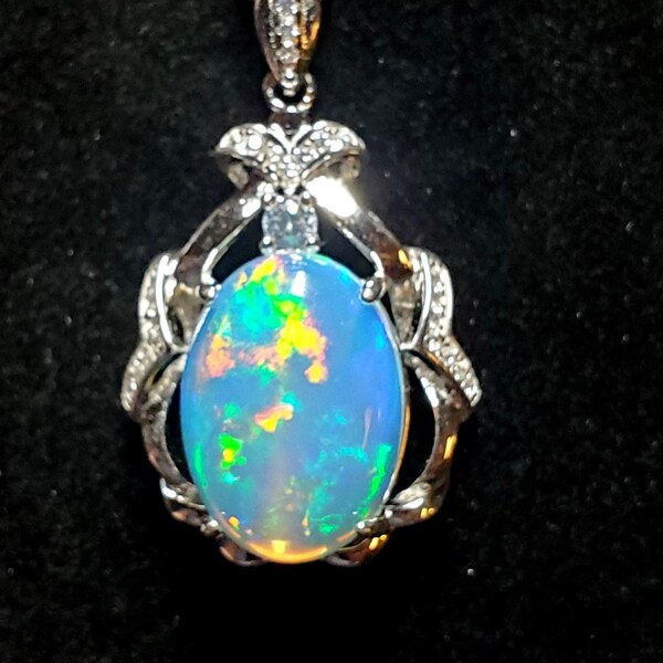 Natural 4.3 Ct Opal Necklace, See Video! 11.5x16mm Ethiopian Opal, 925 Sterling Ribbon Drape Pendant, 20" Sterling Chain. Velvet Box