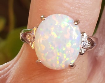 White Fire Opal Sterling Ring,10x12mm Lab Created Opal w/Multicolored Fire. 925 Sterling Floral Design w/ CZ Accents, Adjustable Size 5-8.5