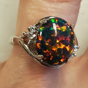 Black Opal Ring, Multicolored Fire See Video! 10x12mm Lab Created Opal, 925 Sterling Artistic Ring w/2 CZs Each Side