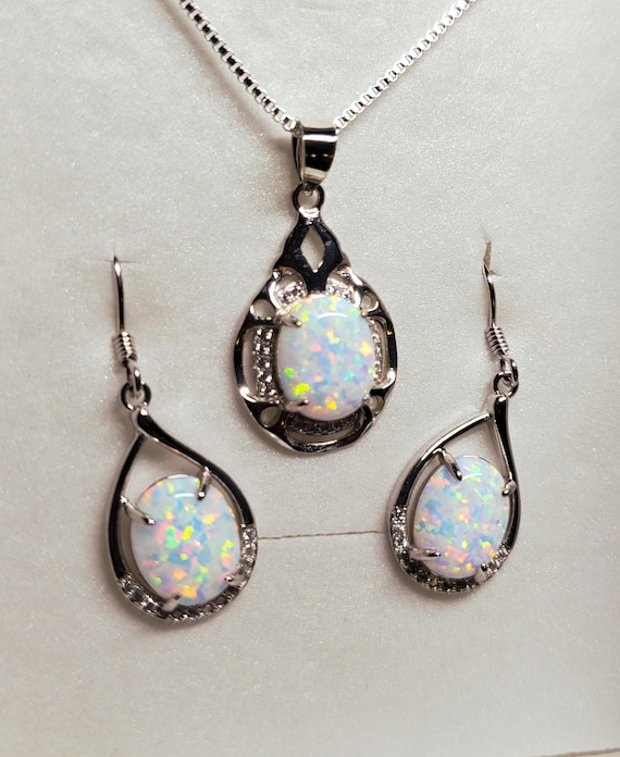 Sterling Silver CZ Framed Oval White Moonstone 18 Sterling Silver CZ Framed Oval White Moonstone 18