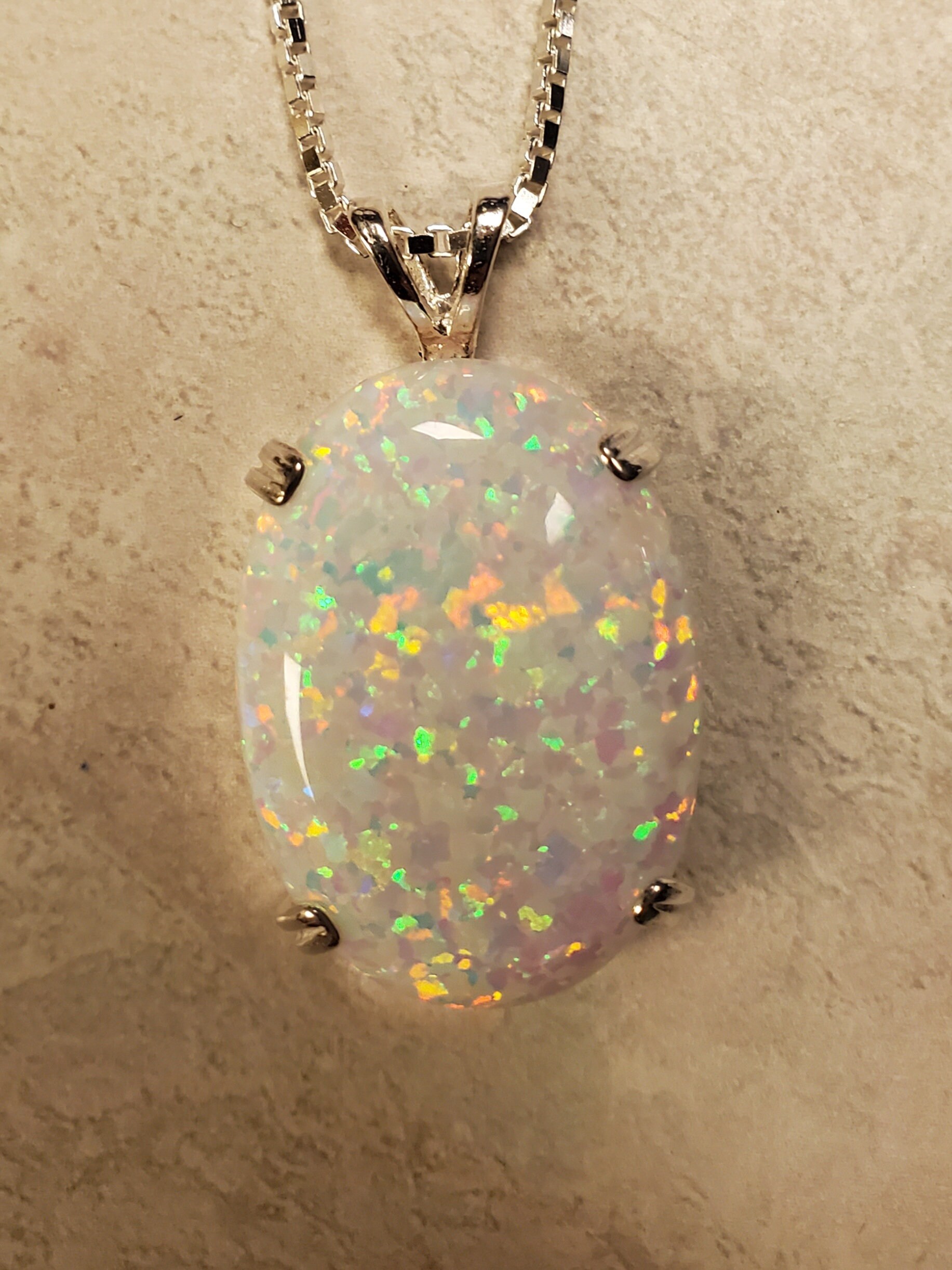 Peora Sterling Silver Infinity Pendant Necklace With Created White Fire Opal - 0.76ct Oval 7x5mm