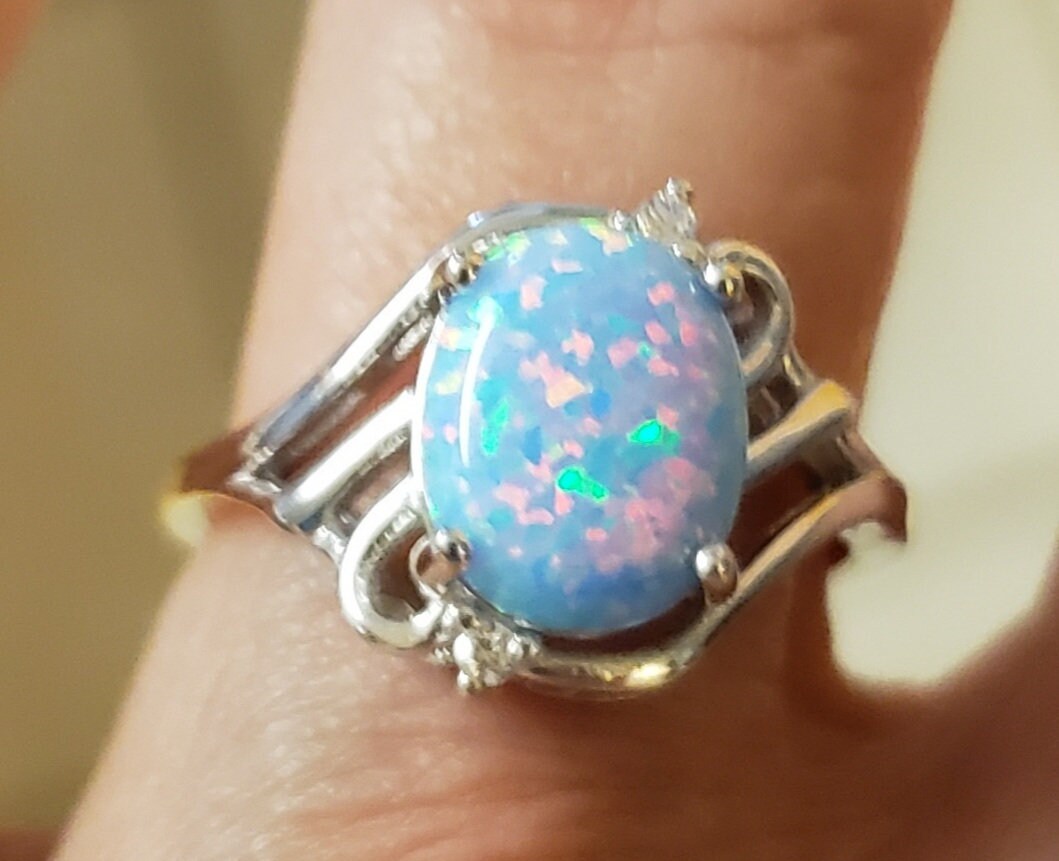 Cornflower Blue Opal Ring, See Video for Pink Flash! 8x10mm Lab Created Opal, 925 Sterling Silver Artistic Ring w/2-CZ Accent Stones Cornflower Blue Opal Ring, See Video for Pink Flash! 8x10mm Lab Created Opal, 925 Sterling Silver Artistic Ring w/2-CZ Accent Stones