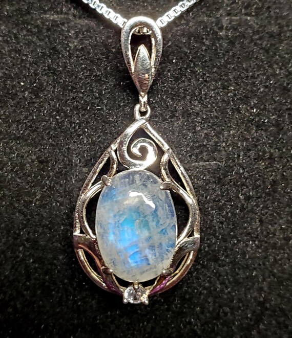 Sterling Silver CZ Framed Oval White Moonstone 18 Sterling Silver CZ Framed Oval White Moonstone 18