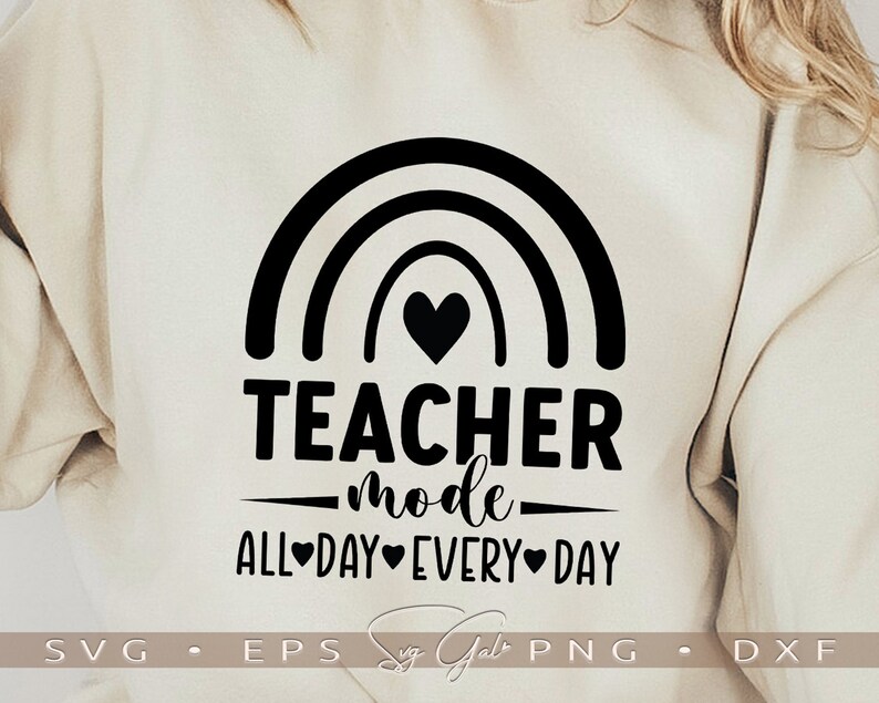 May include: A white sweatshirt with a black rainbow design and the text "Teacher mode all day every day".
