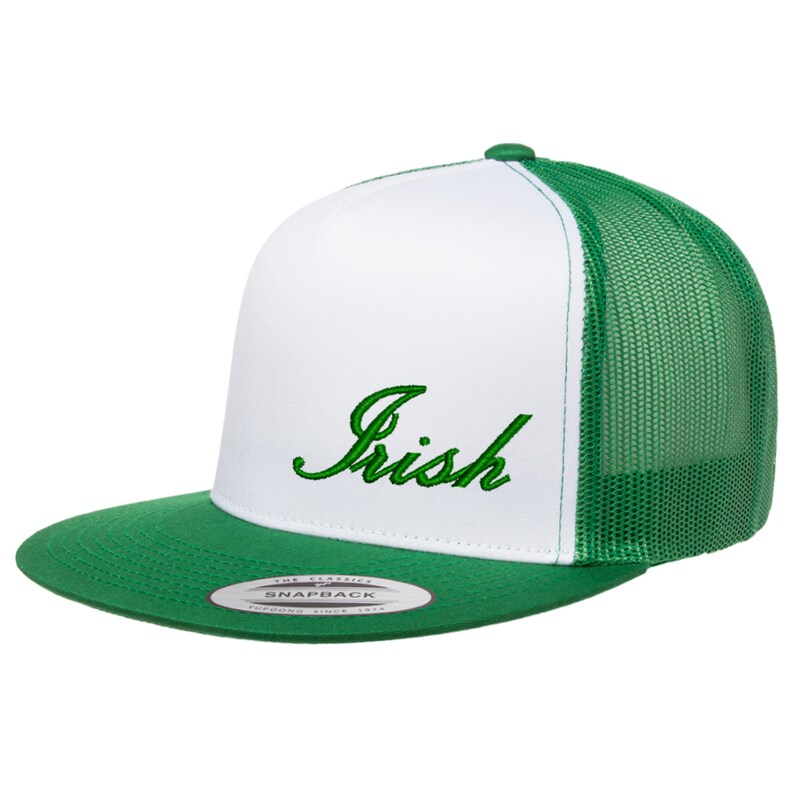 May include: White and green trucker hat with a green embroidered "Irish" logo. The hat has a mesh back and a snap closure.