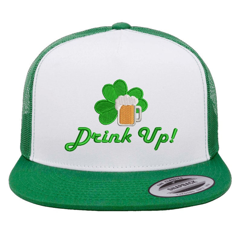 May include: White and green trucker hat with an embroidered shamrock and beer mug. The text "Drink Up!" is embroidered in green on the front of the hat.