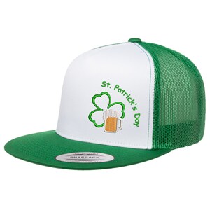 May include: White and green trucker hat with a green shamrock and a beer mug embroidered on the front. The text "St. Patrick's Day" is embroidered on the hat.